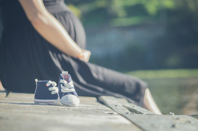 Pregnant woman sitting