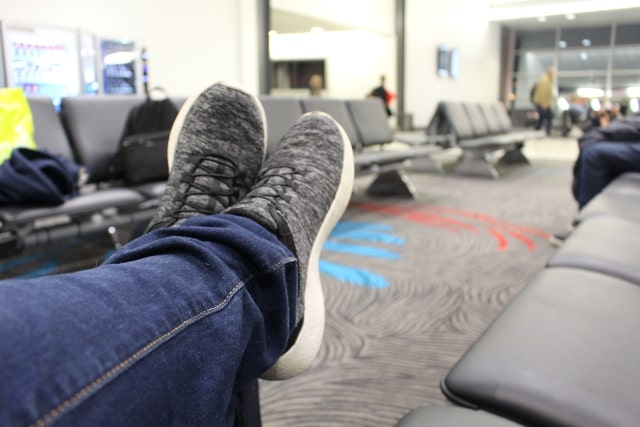 passenger at airport waiting to board a plane